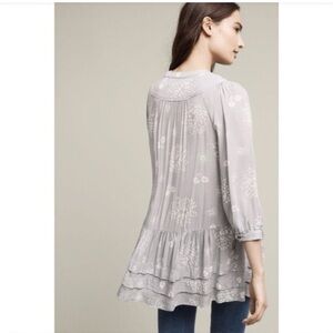 Anthropologie grey floral ruffle top.
